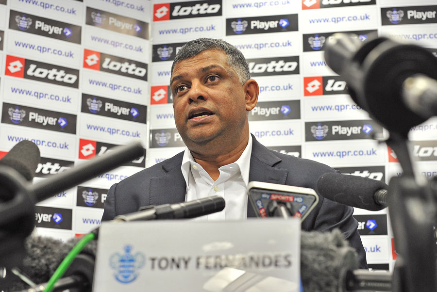 Lotus team principal Tony Fernandes speaks to the press after completing his takeover of Queens Park Rangers