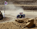 David Coulthard puts the Red Bull show car into what will be turn two at the Circuit of the Americas race track 