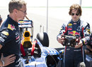 Tom Cruise gets used to the Red Bull steering wheel with David Coulthard