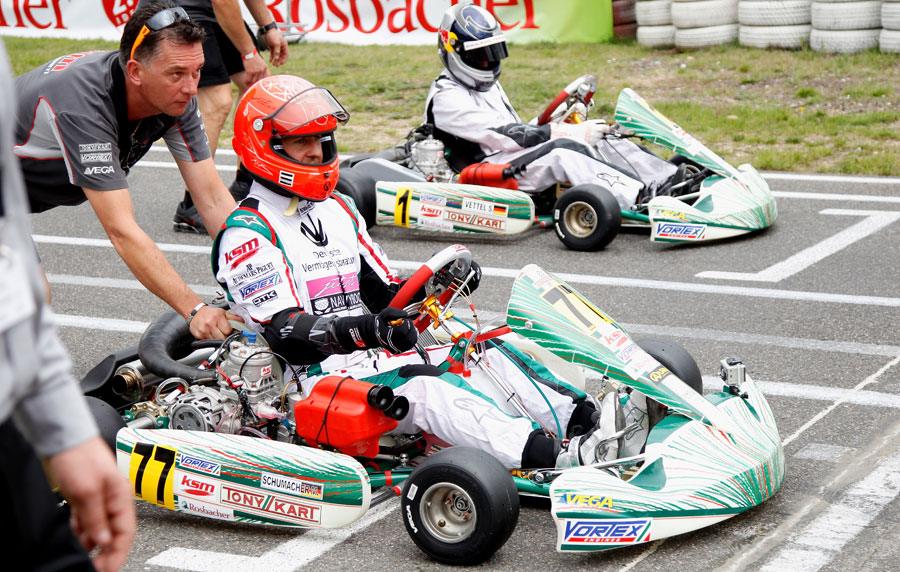 Michael Schumacher and Sebastian Vettel on the grid before a race to celebrate 50 years of the Kart Club Kerpen