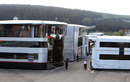 Motorhomes in the paddock with the Ardennes forest as a backdrop