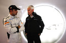 Tonio Liuzzi talks to Geoff Willis in the HRT garage