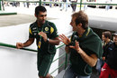 Karun Chandhok chats to Jarno Trulli ahead of first practice