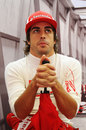 Fernando Alonso waits patiently in the pits