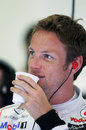 Jenson Button enjoys a warming cup of tea