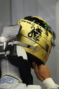 Michael Schumacher sporting a new helmet design to commemorate the 20th anniversary of his first F1 start