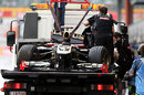 Bruno Senna's crippled Renault is towed away