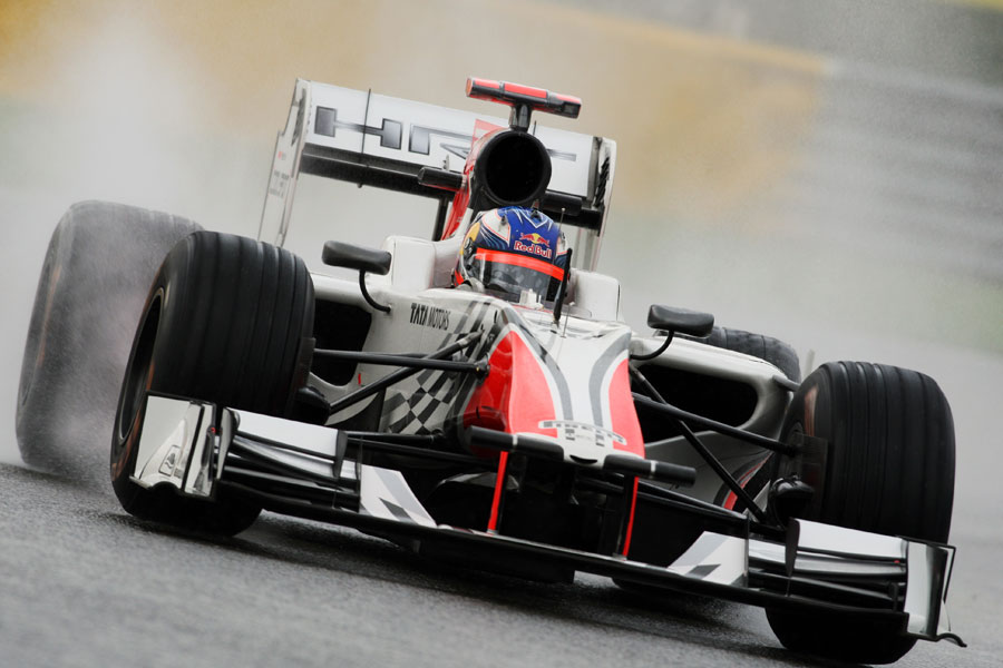 Daniel Ricciardo ploughs through the standing water during FP3