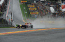 Mark Webber negotiates Eau Rouge in the wet