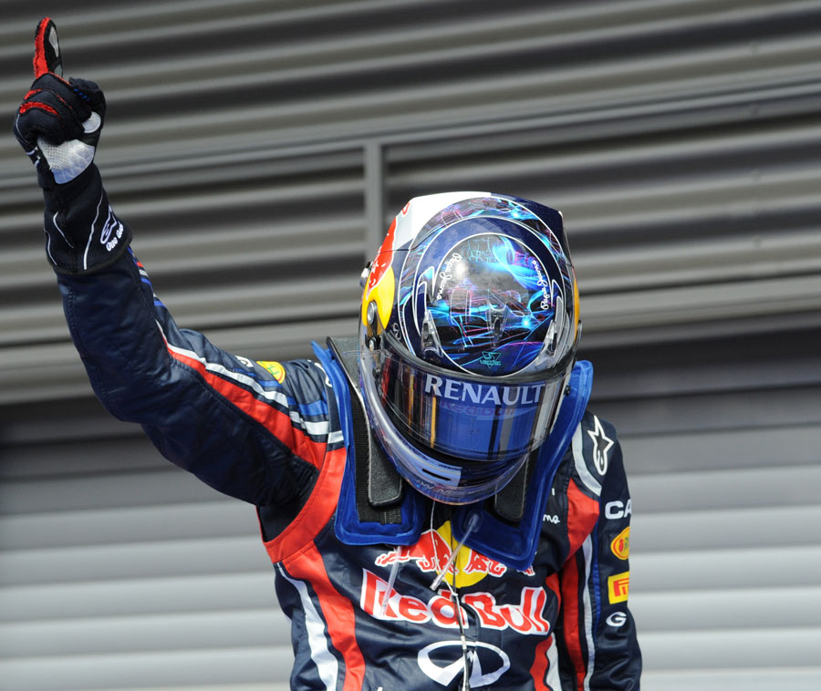 Sebastian Vettel celebrates winning the Belgian Grand Prix