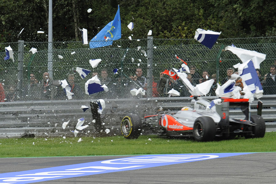Lewis Hamilton smashes through polystyrene bollards