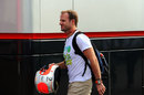 Rubens Barrichello arrives in the paddock for his 320th appearance at a grand prix