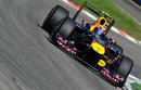 Mark Webber attacks the Ascari chicane with his DRS open