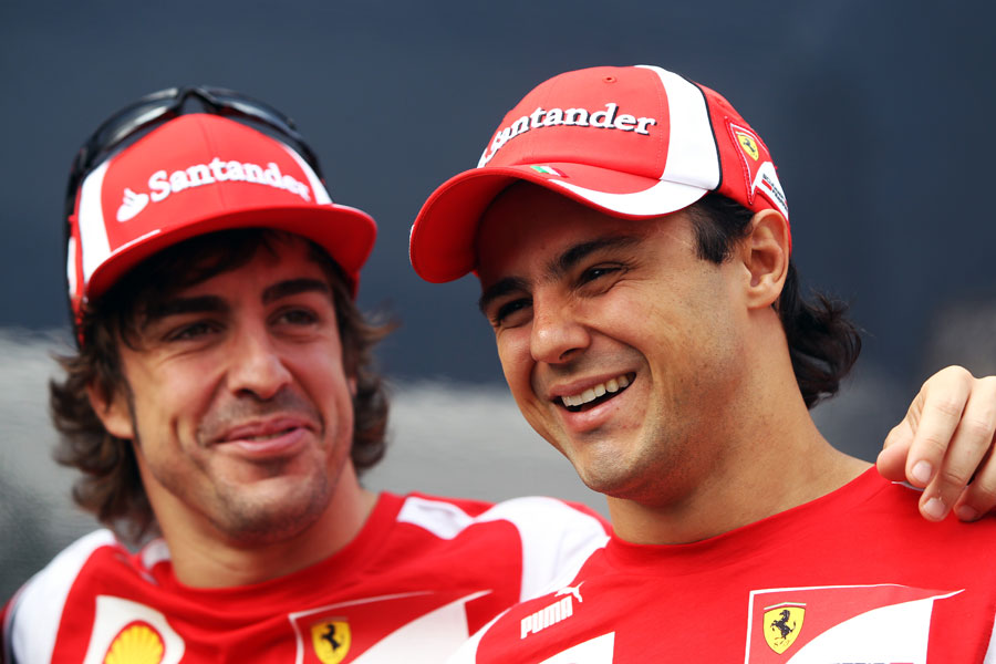 Fernando Alonso and Felipe Massa share a joke