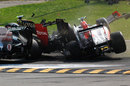 Tonio Liuzzi ploughs in to the side of Vitaly Petrov