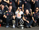 Sebastian Vettel celebrates his victory with Christian Horner and Adrian Newey