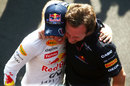 Sebastian Vettel celebrates his victory with Christian Horner