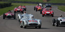 Stirling Moss (658) leads the tribute to Juan Manuel Fangio