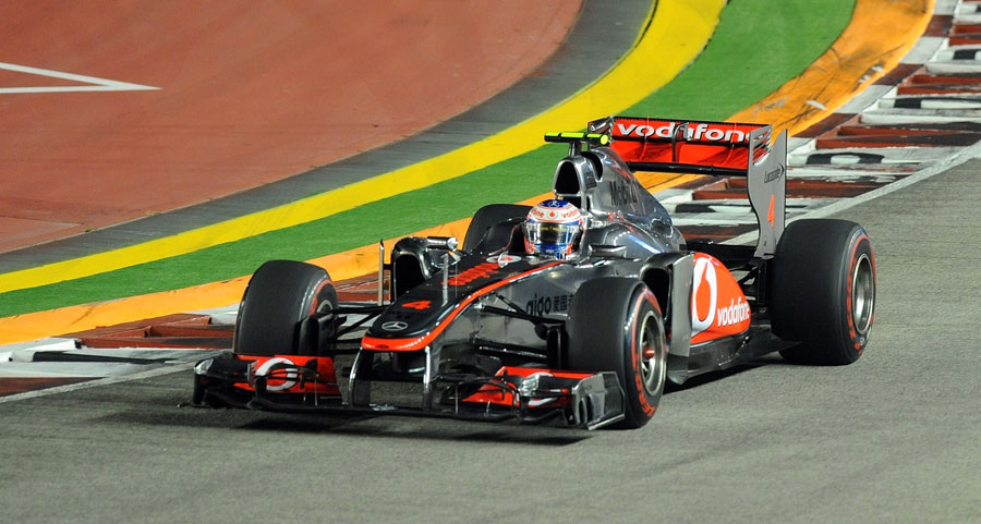 Jenson Button exiting turn two