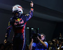 Sebastian Vettel celebrates his victory in his customary style