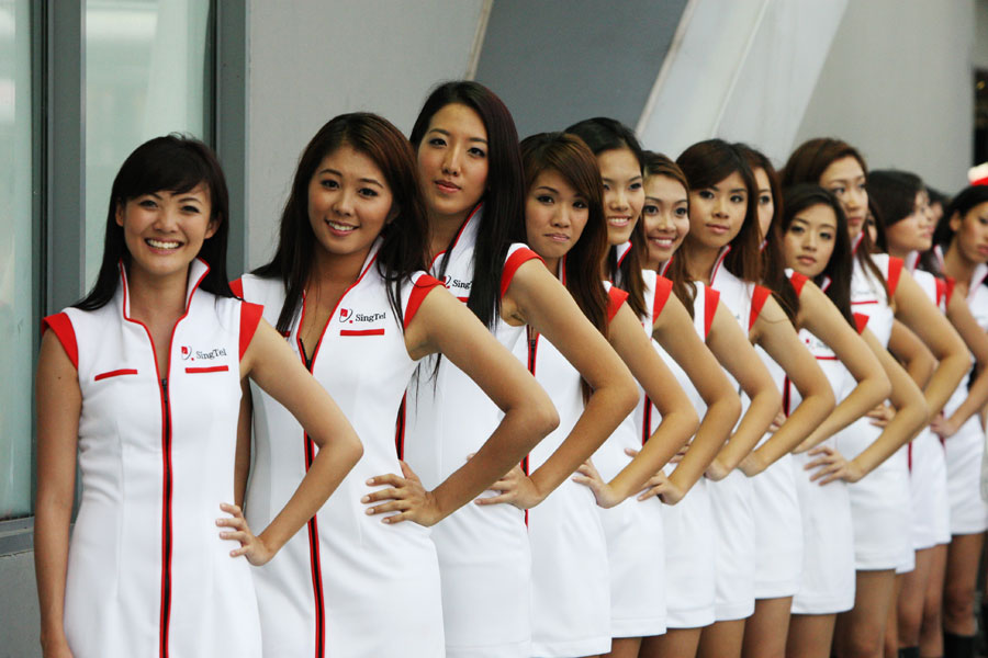 Grid girls ahead of the race