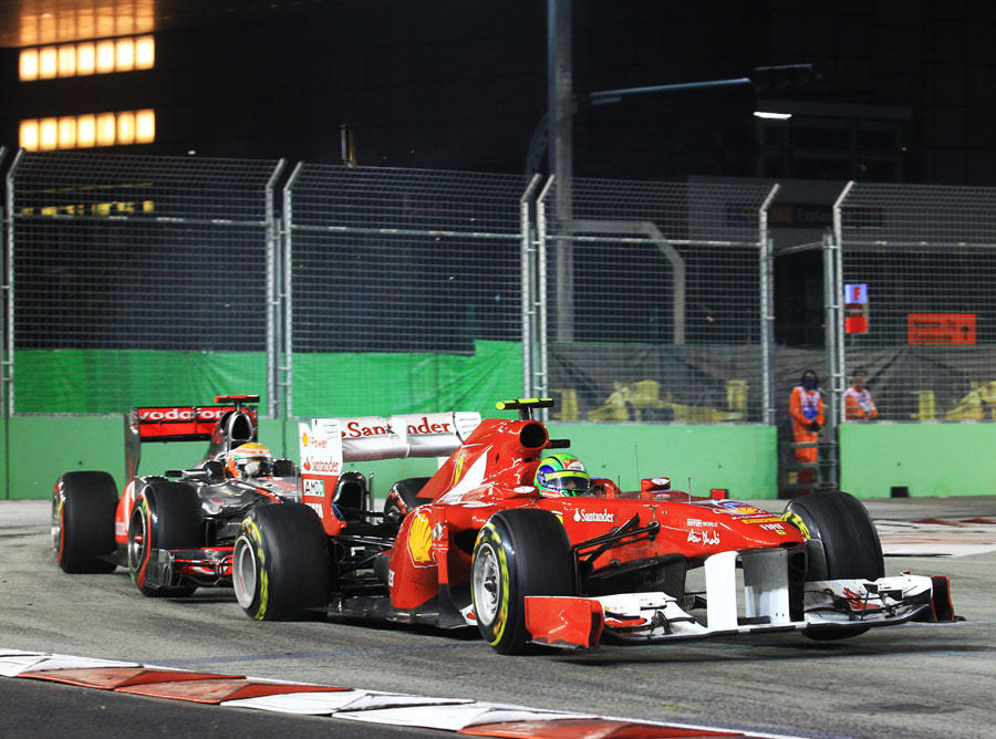 Lewis Hamilton punctures Felipe Massa's rear tyre