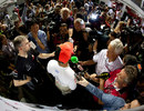 Lewis Hamilton faces the media scrum after the Singapore Grand Prix