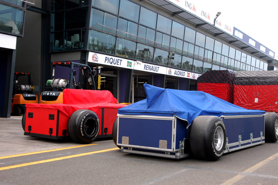 Freight is unloaded in the pit lane