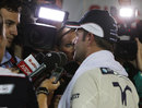 Rubens Barrichello faces the world's press