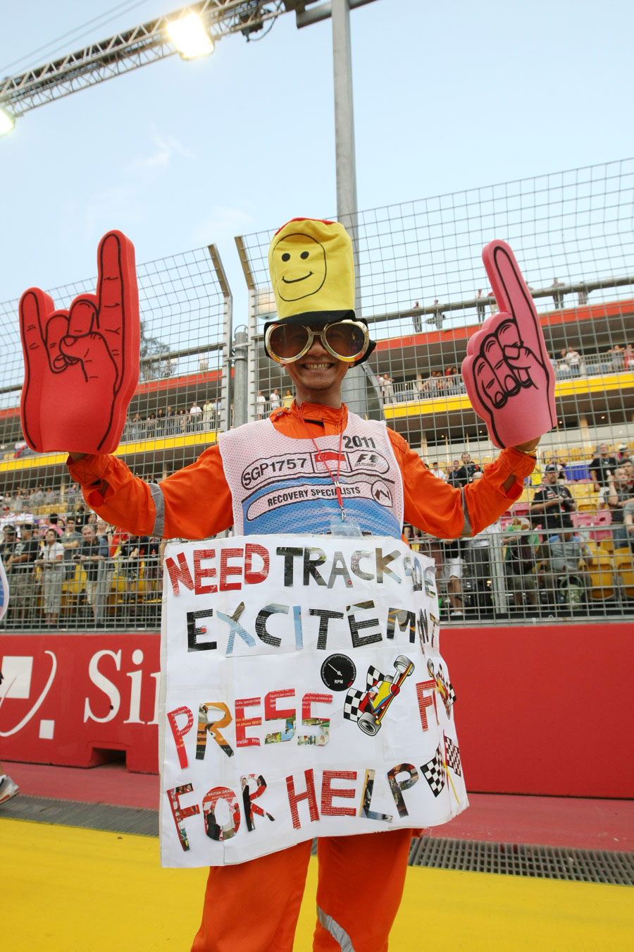 A track marshal dresses up before the race