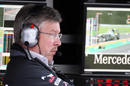 Ross Brawn deep in thought on the Mercedes pit wall