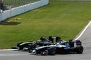 Jarno Trulli and Rubens Barrichello battle for position
