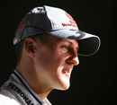 Michael Schumacher talks to the press at the Mercedes GP launch