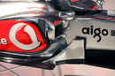 A close-up on detailing around the small sidepod intakes on the MP4-25