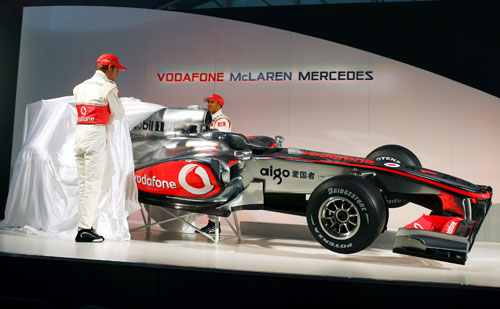 Jenson Button and Lewis Hamilton pull the covers off the 2010 McLaren