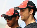 Lewis Hamilton and Jenson Button in the paddock
