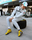 Nico Rosberg admires his new racing boots