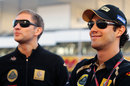 Vitaly Petrov and Bruno Senna in the pit lane
