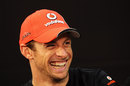Jenson Button enjoys a joke in the driver press conference