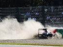 Sebastian Vettel crashes into the barriers at Degner 2 during first practice