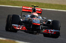 Jenson Button on his way to the fastest time in first practice