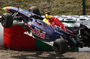 Sebastian Vettel's Red Bull is lifted away