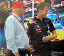 Sebastian Vettel and Niki Lauda chat in the Red Bull hospitality