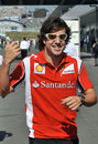 Fernando Alonso arrives at the circuit on Saturday morning