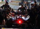 Red Bull complete a practise pit stop on Mark Webber's car