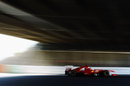Fernando Alonso passes under the track crossover
