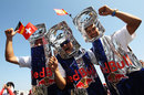 Red Bull fans dressed as Red Bull cans