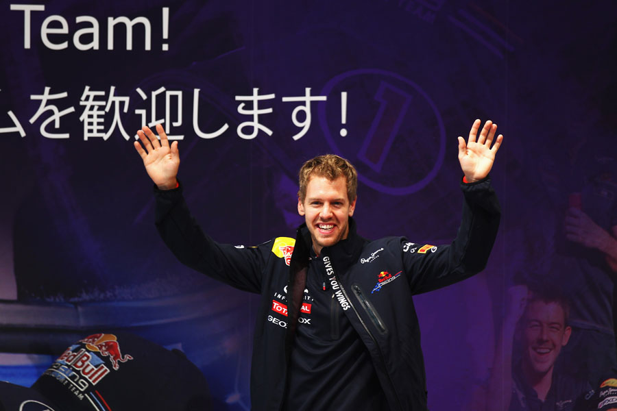 Sebastian Vettel enjoys the reception at Nissan HQ after winning his second world championship