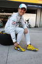 Nico Rosberg models his new racing boots designed by an Alpinestars competition winner
