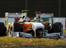Paul di Resta leads Force India team-mate Adrian Sutil on track